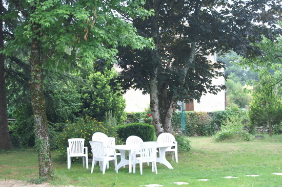 Table and chairs in the shade